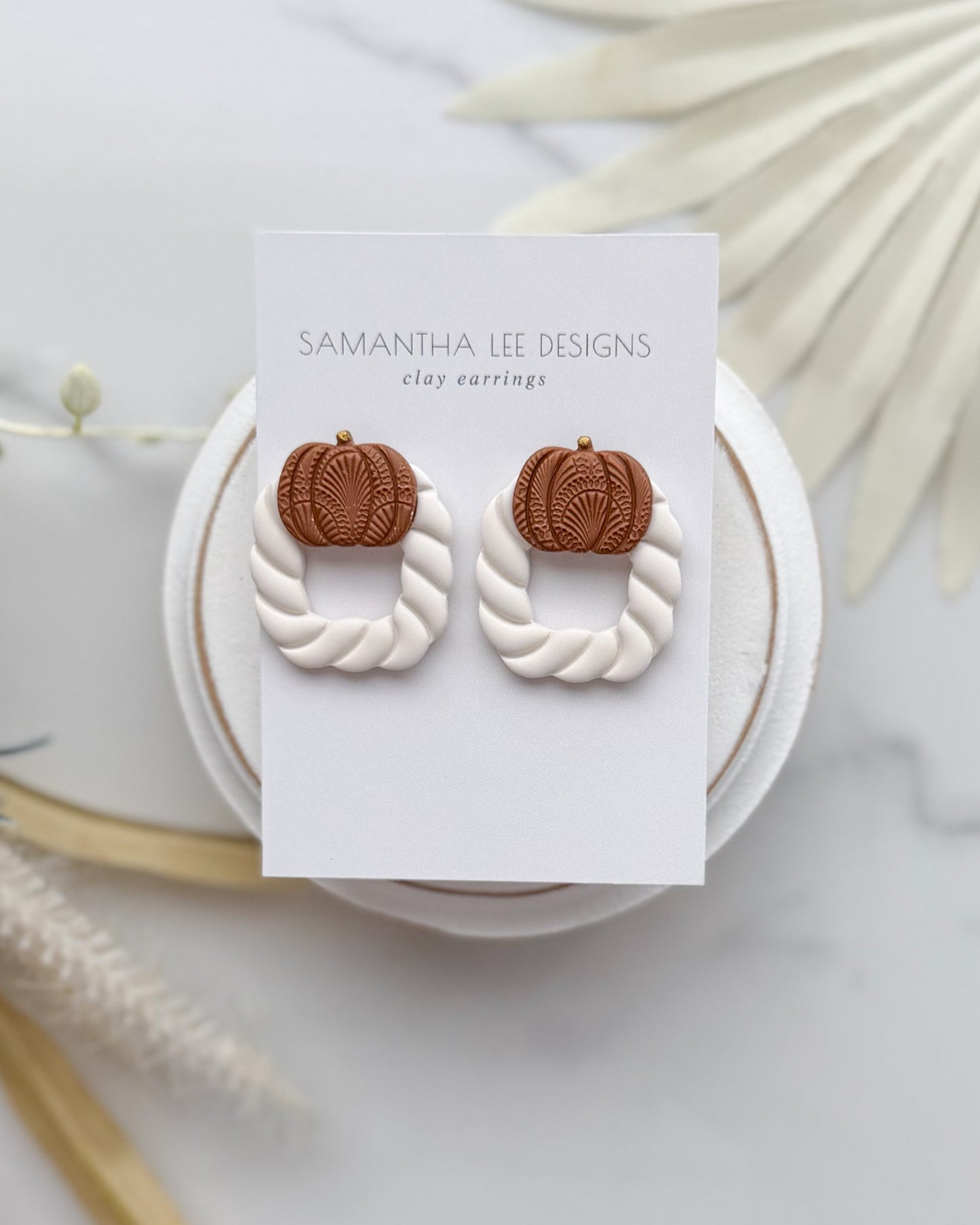 Brown and Alabaster Door Knockers
